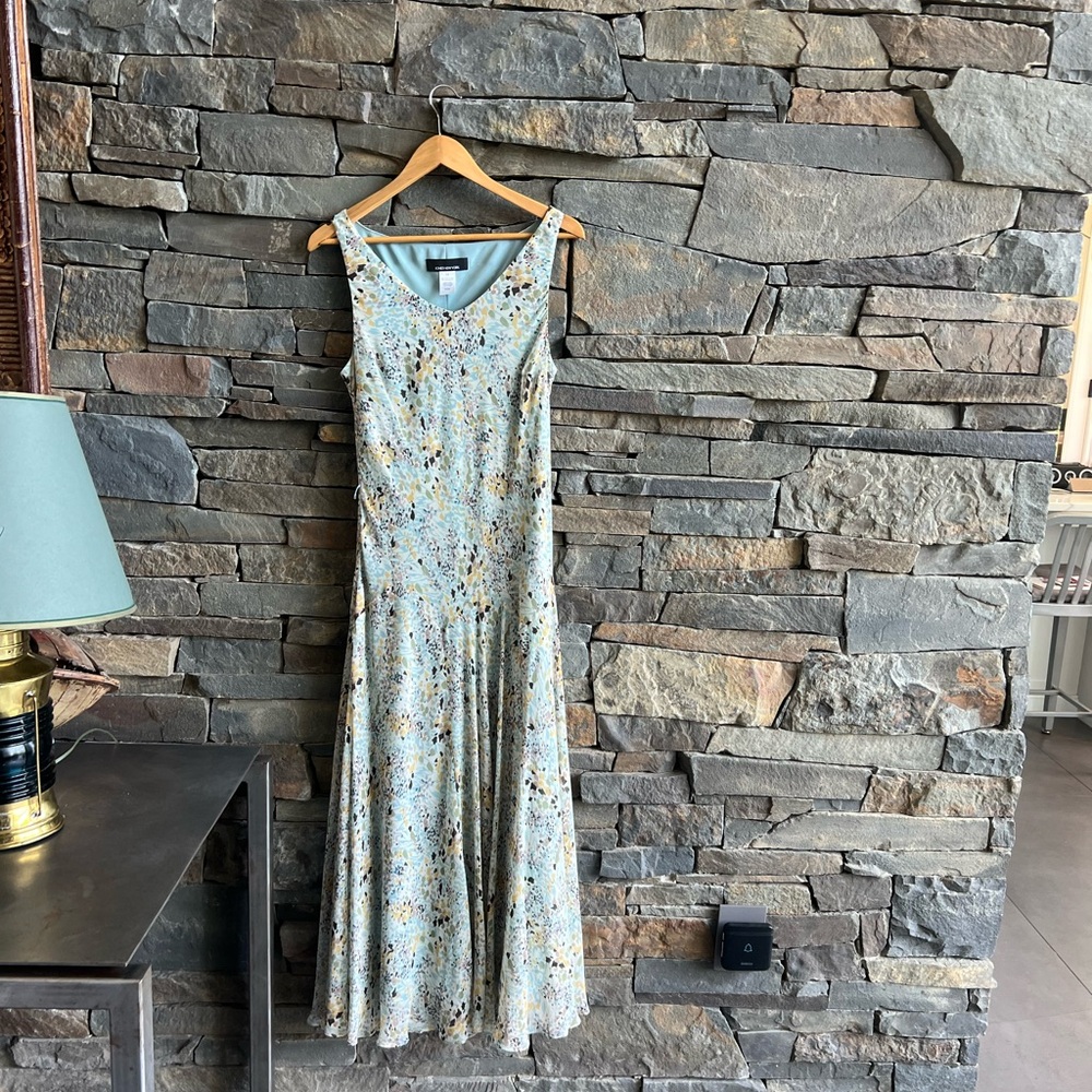 Mid length lined silk dress by Jones NY in size 14. Perfect condition.